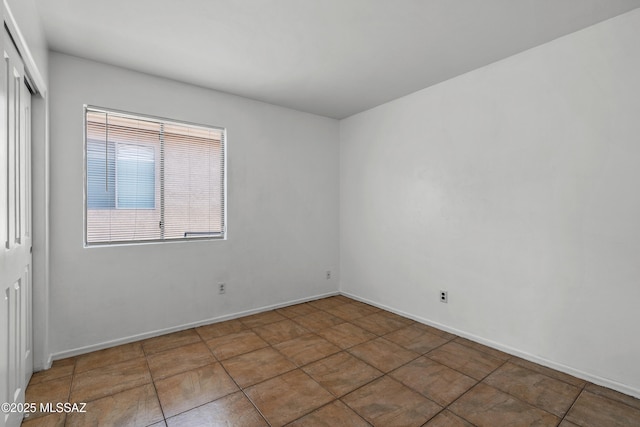 9969 E Apache Rain Dr, Tucson, AZ 85748 - empty room with baseboards