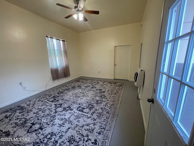 1094 N Pomerene Rd, Benson, AZ 85602 - spare room with ceiling fan, heating unit, and baseboards
