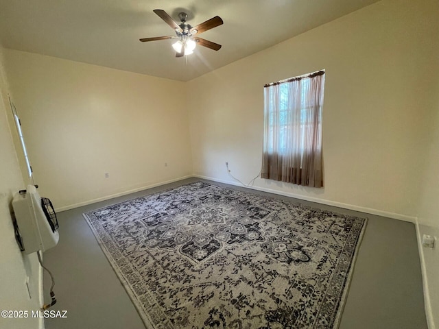 1094 N Pomerene Rd, Benson, AZ 85602 - spare room featuring ceiling fan, baseboards, and heating unit