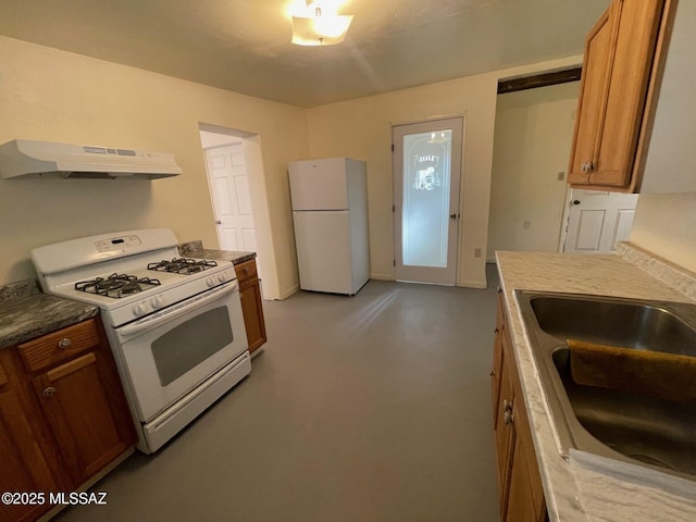 1094 N Pomerene Rd, Benson, AZ 85602 - kitchen featuring white appliances, extractor fan, a sink, brown cabinets, and concrete flooring