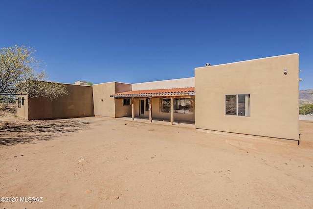 1503 Camino Bacalao, Rio Rico, AZ 85648 - rear view of house with a tile roof, a patio area, and stucco siding