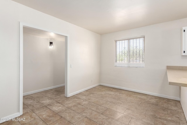 201 W Macarthur St, Tucson, AZ 85714 - empty room with baseboards