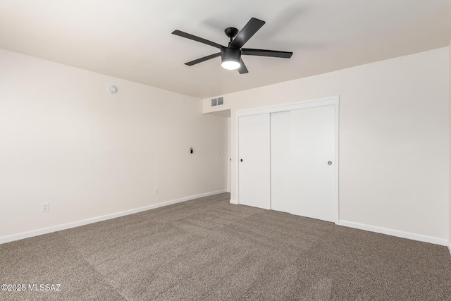 201 W Macarthur St, Tucson, AZ 85714 - unfurnished bedroom featuring carpet flooring, a closet, and a ceiling fan
