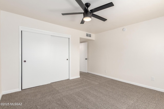 201 W Macarthur St, Tucson, AZ 85714 - unfurnished bedroom featuring carpet floors, a closet, and ceiling fan