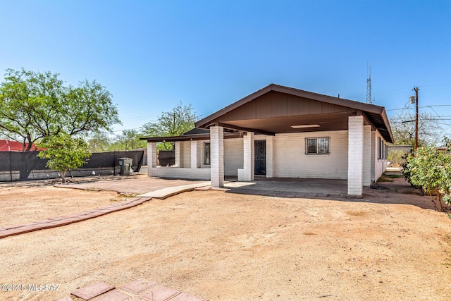201 W Macarthur St, Tucson, AZ 85714 - back of house featuring a patio area and an attached carport