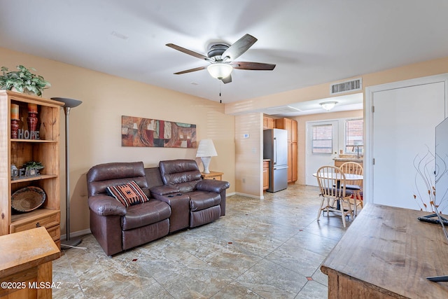 503 S Paseo Lobo Unit A, Green Valley, AZ 85614 - living room featuring ceiling fan