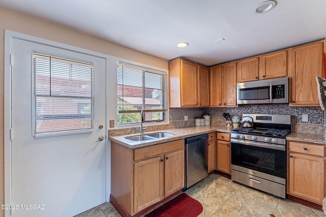 503 S Paseo Lobo Unit A, Green Valley, AZ 85614 - kitchen featuring stainless steel appliances, a sink, backsplash, light stone counters, and recessed lighting