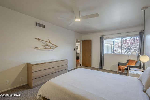 3940 E Timrod St Unit 226, Tucson, AZ 85711 - carpeted bedroom featuring baseboards and ceiling fan