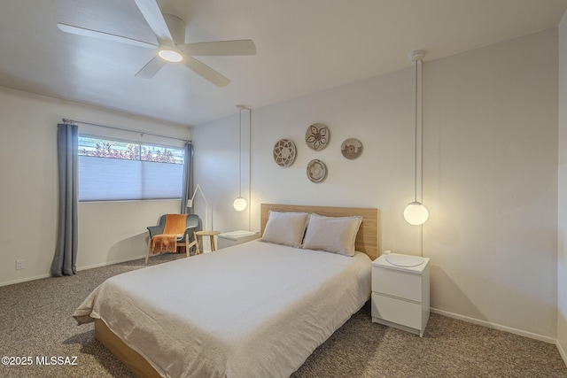 3940 E Timrod St Unit 226, Tucson, AZ 85711 - carpeted bedroom with baseboards and a ceiling fan