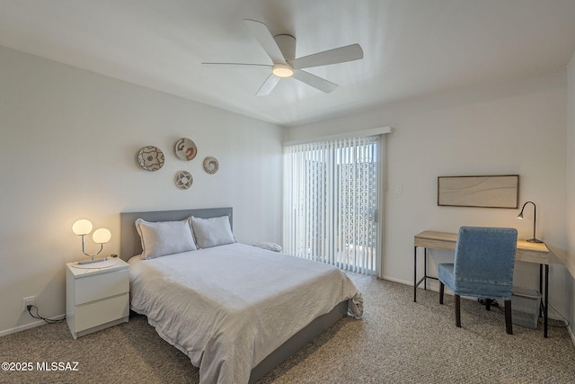3940 E Timrod St Unit 226, Tucson, AZ 85711 - carpeted bedroom with a ceiling fan and baseboards