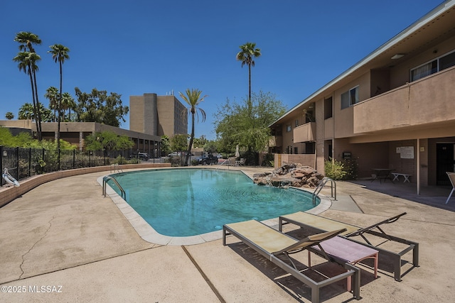 3940 E Timrod St Unit 226, Tucson, AZ 85711 - community pool featuring a patio