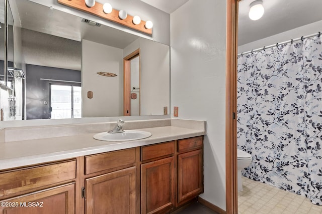 7777 E Golf Links Rd Unit 2105, Tucson, AZ 85730 - bathroom featuring vanity, curtained shower, and tile patterned floors