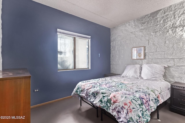 7777 E Golf Links Rd Unit 2105, Tucson, AZ 85730 - bedroom featuring an accent wall and a textured ceiling