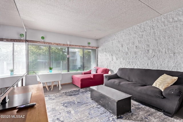 7777 E Golf Links Rd Unit 2105, Tucson, AZ 85730 - living room featuring concrete flooring and a textured ceiling