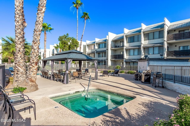 7777 E Golf Links Rd Unit 2105, Tucson, AZ 85730 - view of pool with a gazebo, a community hot tub, and a patio
