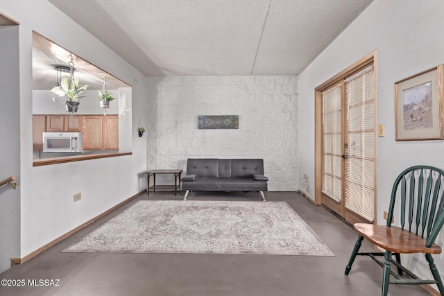 7777 E Golf Links Rd Unit 2105, Tucson, AZ 85730 - living area with concrete flooring and a textured ceiling