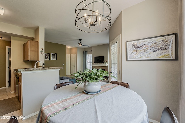 1500 E Pusch Wilderness Dr Unit 15205, Oro Valley, AZ 85737 - dining area with a chandelier and light tile patterned floors