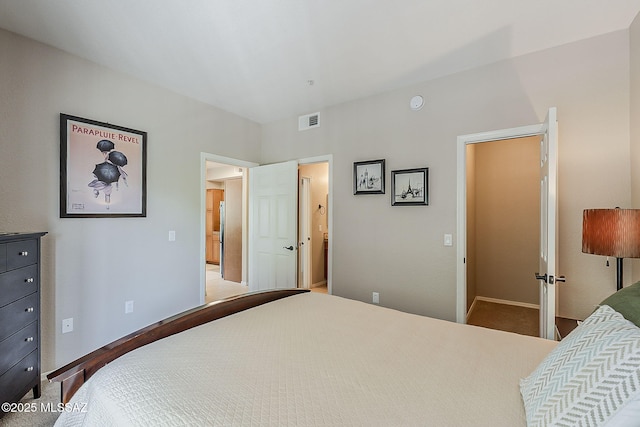 1500 E Pusch Wilderness Dr Unit 15205, Oro Valley, AZ 85737 - carpeted bedroom with baseboards