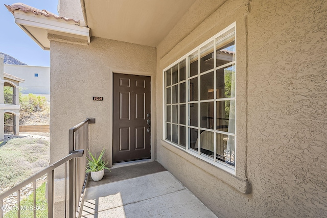 1500 E Pusch Wilderness Dr Unit 15205, Oro Valley, AZ 85737 - entrance to property with stucco siding and a balcony