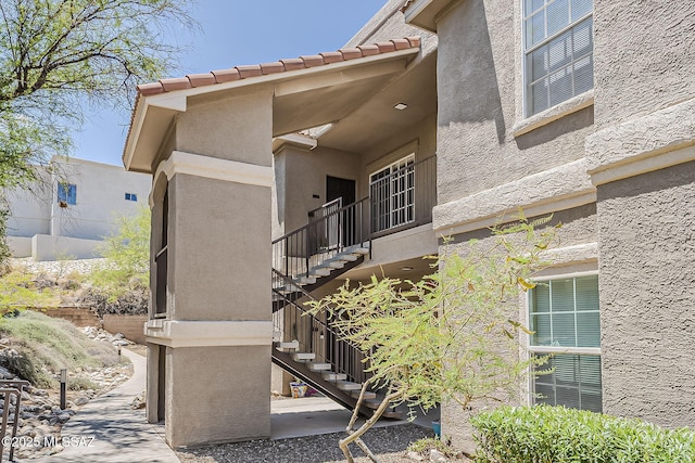 1500 E Pusch Wilderness Dr Unit 15205, Oro Valley, AZ 85737 - entrance to property featuring stucco siding