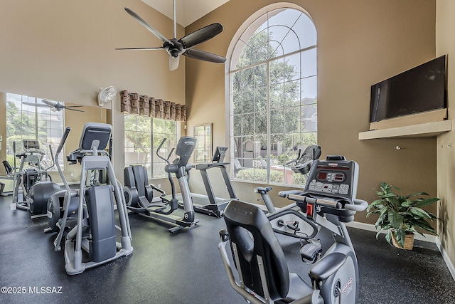 1500 E Pusch Wilderness Dr Unit 15205, Oro Valley, AZ 85737 - exercise room featuring ceiling fan, plenty of natural light, and a towering ceiling
