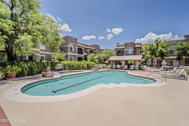 1500 E Pusch Wilderness Dr Unit 15205, Oro Valley, AZ 85737 - community pool with a patio and a hot tub