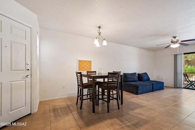 7255 E Snyder Rd Unit 9103, Tucson, AZ 85750 - dining area featuring a chandelier, light tile patterned floors, and ceiling fan