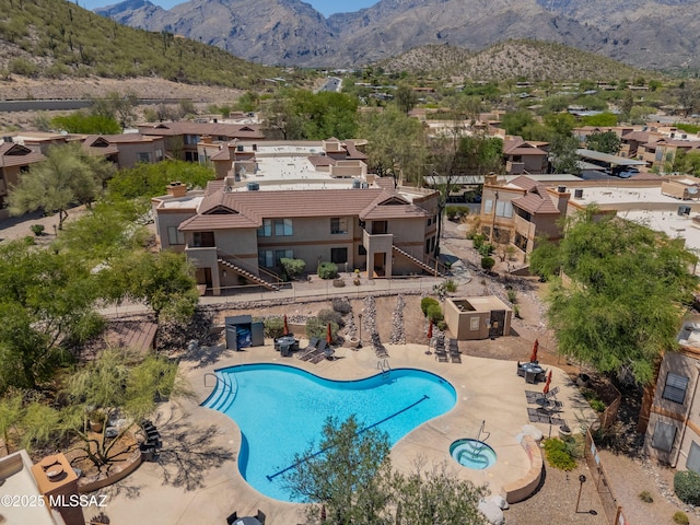 7255 E Snyder Rd Unit 9103, Tucson, AZ 85750 - community pool with a mountain view, a residential view, a patio, and stairway
