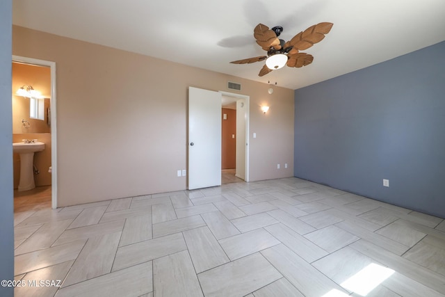 1641 S San Carla, Green Valley, AZ 85614 - unfurnished bedroom with ensuite bathroom and a ceiling fan