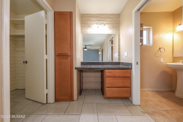 1641 S San Carla, Green Valley, AZ 85614 - bathroom featuring a ceiling fan and tile patterned floors