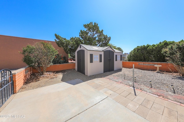1641 S San Carla, Green Valley, AZ 85614 - fenced backyard with a shed and a patio