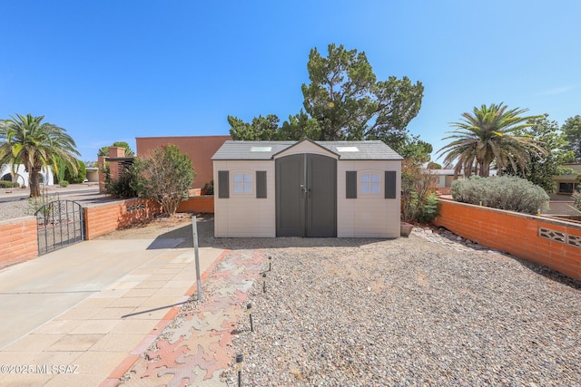 1641 S San Carla, Green Valley, AZ 85614 - view of shed featuring a gate