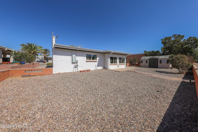 1641 S San Carla, Green Valley, AZ 85614 - back of house with a storage unit