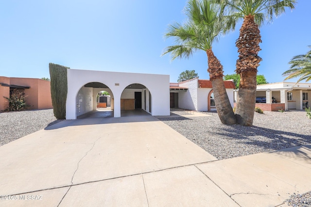 1641 S San Carla, Green Valley, AZ 85614 - mediterranean / spanish-style house with stucco siding and concrete driveway