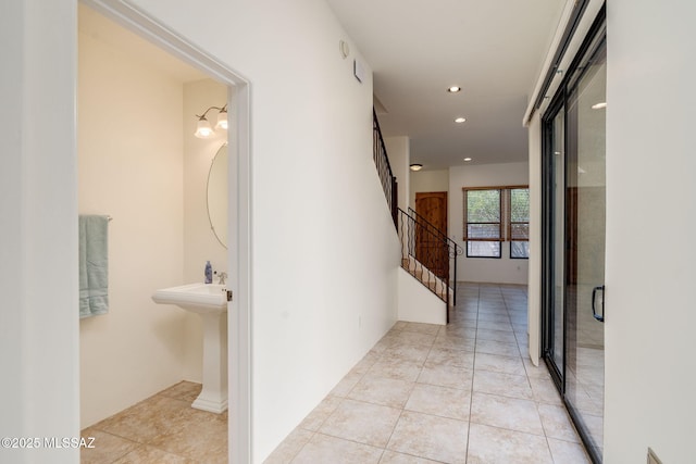 139 E Castlefield Cir, Tucson, AZ 85704 - hallway featuring light tile patterned floors, recessed lighting, and stairway