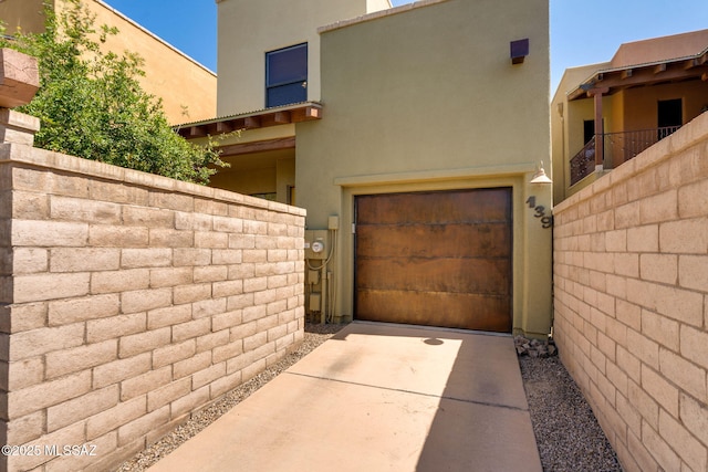 139 E Castlefield Cir, Tucson, AZ 85704 - view of side of property featuring stucco siding and a garage
