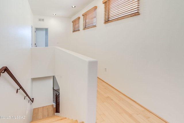 139 E Castlefield Cir, Tucson, AZ 85704 - stairway with wood finished floors and recessed lighting