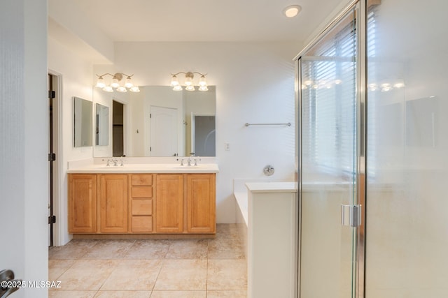 139 E Castlefield Cir, Tucson, AZ 85704 - bathroom with double vanity, a bath, a shower with shower door, and tile patterned flooring