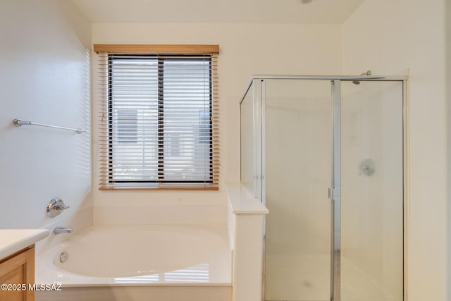 139 E Castlefield Cir, Tucson, AZ 85704 - full bathroom featuring vanity, a bath, and a shower stall