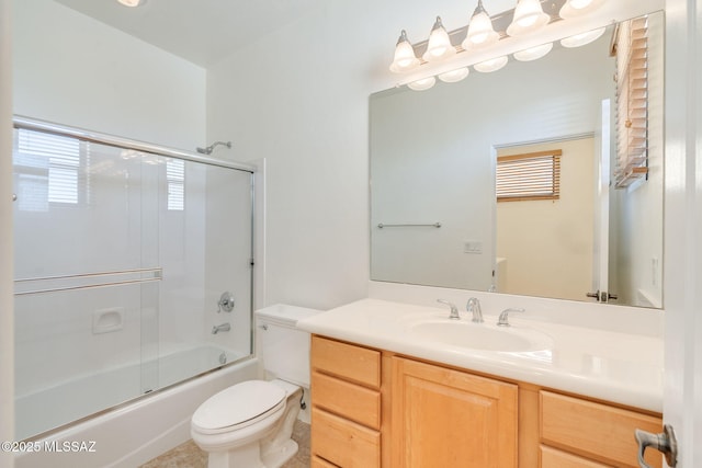 139 E Castlefield Cir, Tucson, AZ 85704 - full bathroom featuring vanity, combined bath / shower with glass door, and healthy amount of natural light