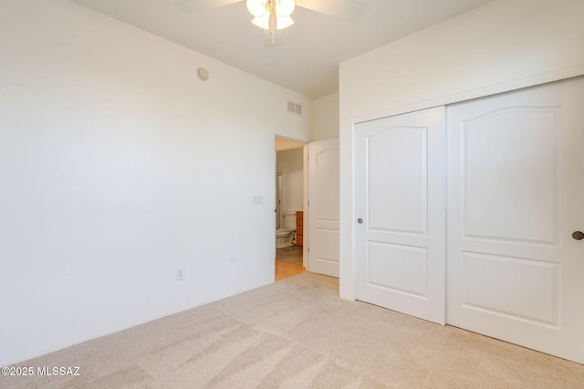 139 E Castlefield Cir, Tucson, AZ 85704 - unfurnished bedroom with light colored carpet, a closet, and ceiling fan