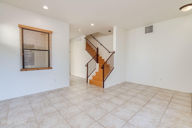 139 E Castlefield Cir, Tucson, AZ 85704 - empty room with stairway, recessed lighting, and light tile patterned floors