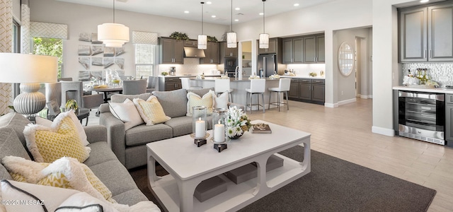 61784 E Travertine St, Oracle, AZ 85623 - living area with beverage cooler, recessed lighting, and bar area