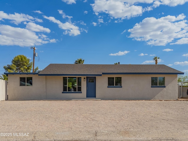 6222 E 15th St, Tucson, AZ 85711 - single story home featuring stucco siding and a shingled roof