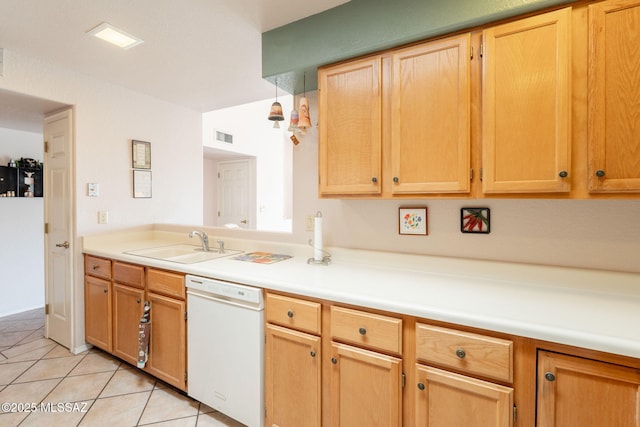 1857 W Dalehaven Cir, Tucson, AZ 85704 - kitchen with white dishwasher, light tile patterned floors, light countertops, and light brown cabinets