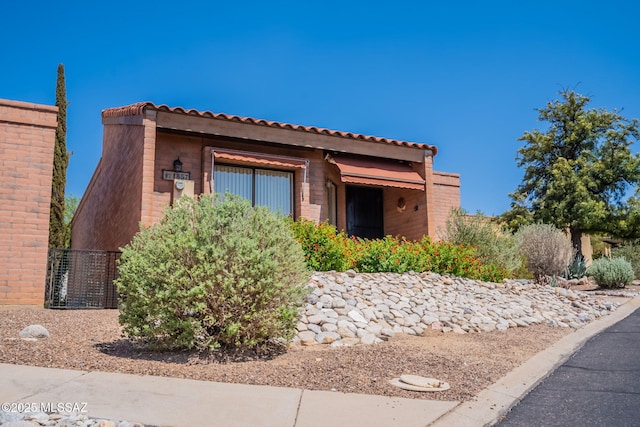 1857 W Dalehaven Cir, Tucson, AZ 85704 - view of home's exterior featuring a tiled roof