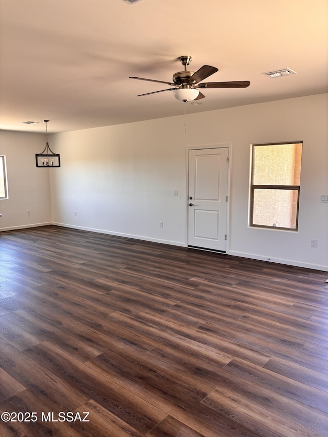 3152 E Andrada Rd, Vail, AZ 85641 - unfurnished room featuring dark wood-style floors and ceiling fan