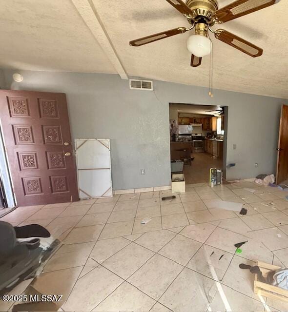 641 W Teton St, Tucson, AZ 85756 - tiled living area with a ceiling fan and a textured ceiling