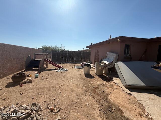 641 W Teton St, Tucson, AZ 85756 - view of yard with a playground