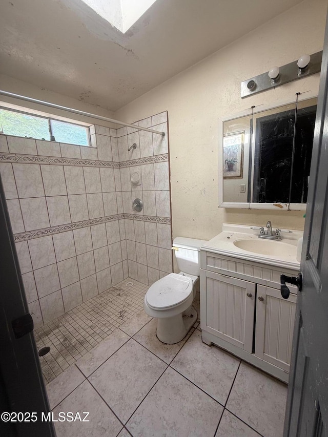 641 W Teton St, Tucson, AZ 85756 - bathroom featuring vanity, a stall shower, and tile patterned flooring